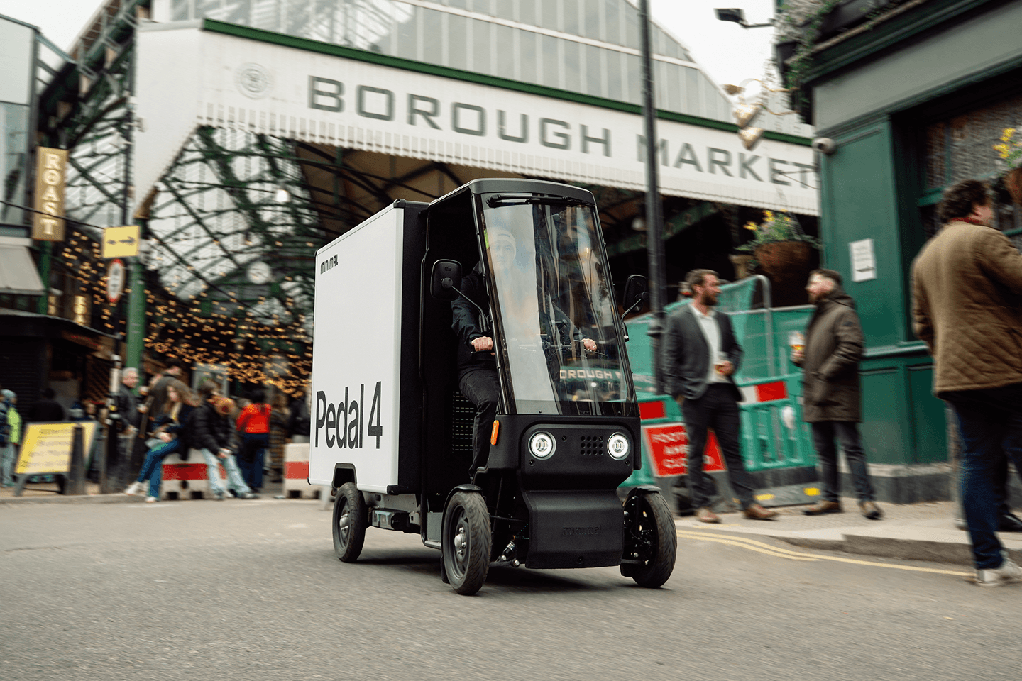 Minimal vehicle parked inside a workshop